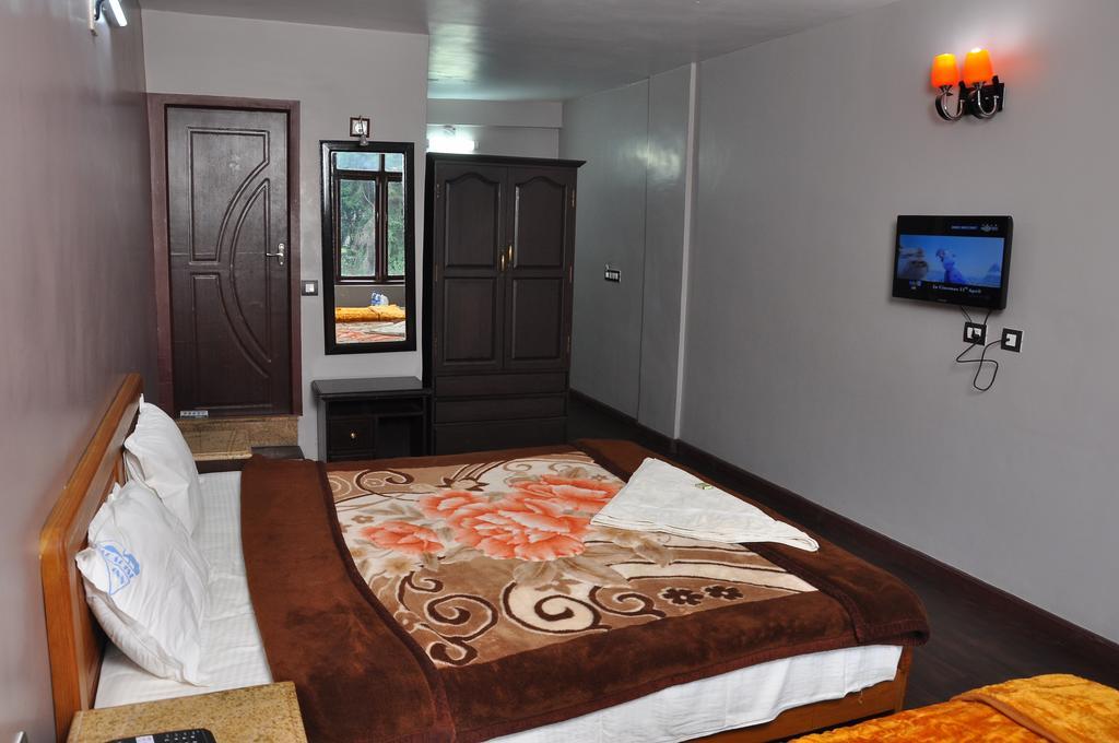 Grand Paradise Inn Kodaikanal Rom bilde