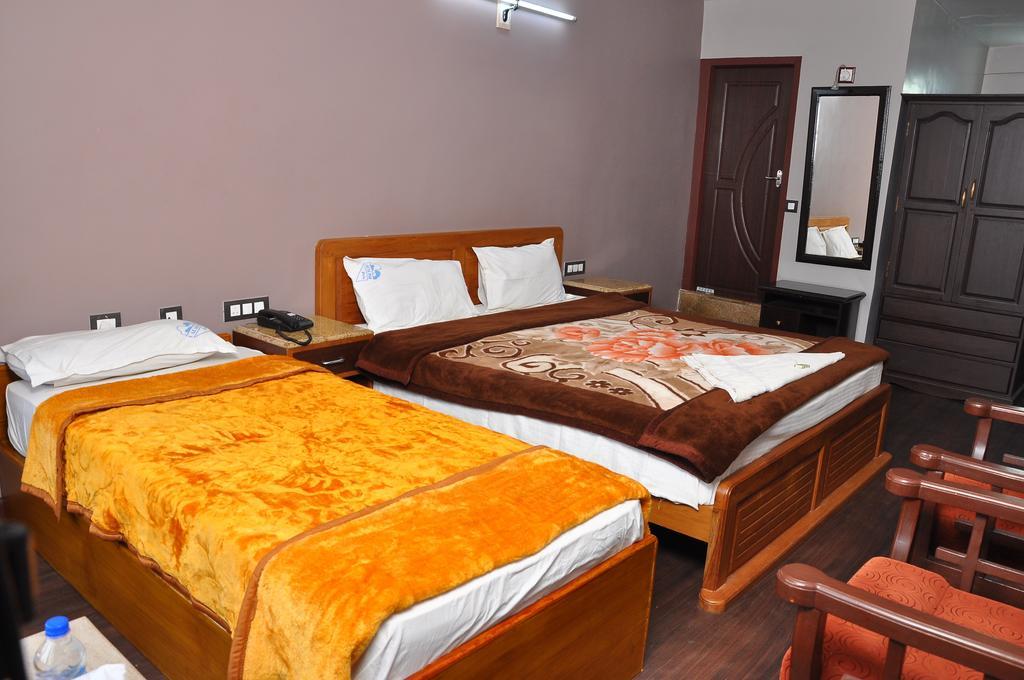 Grand Paradise Inn Kodaikanal Rom bilde