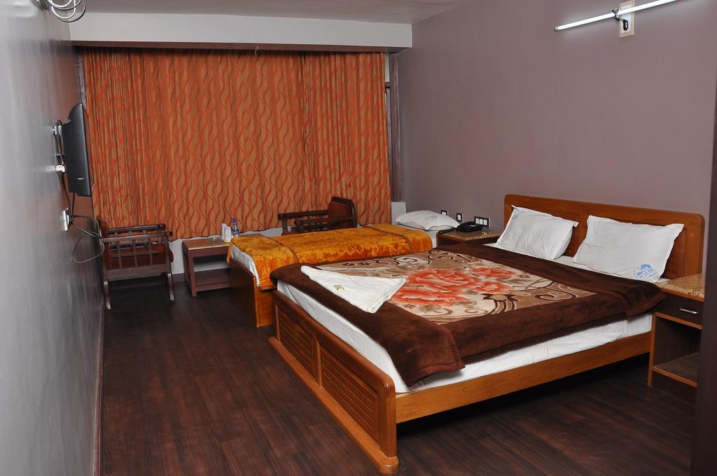 Grand Paradise Inn Kodaikanal Rom bilde